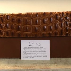 Raika leather clutch NWOT